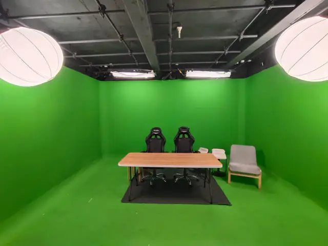 Greenscreen studio with talk-show desk
